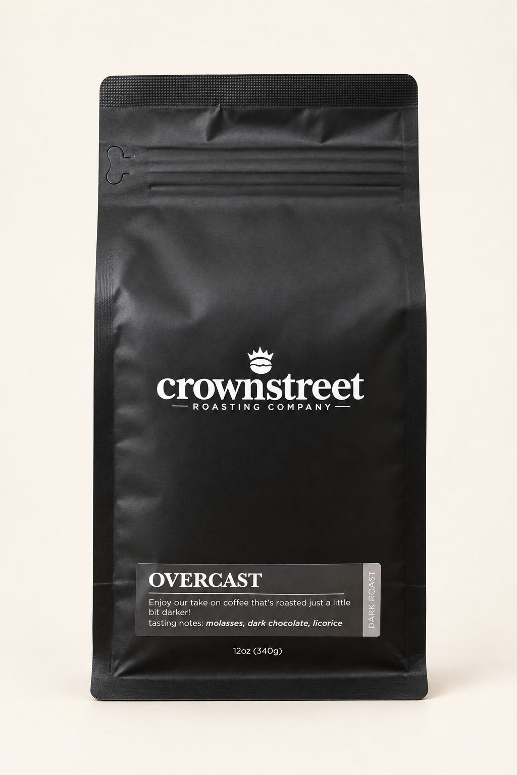 Crownstreet Overcast Dark Roast coffee, 12 oz bag on a neutral background